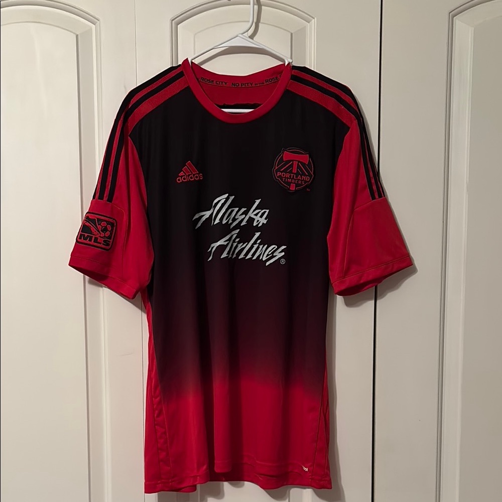 Gently used Adidas Men’s Red and Black Portland Timbers Soccer Jersey.